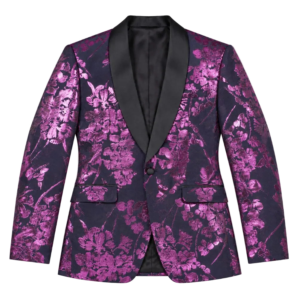 A men's single-breasted blazer with a vibrant magenta and purple floral jacquard pattern over a dark navy base, featuring contrasting black satin shawl lapels.