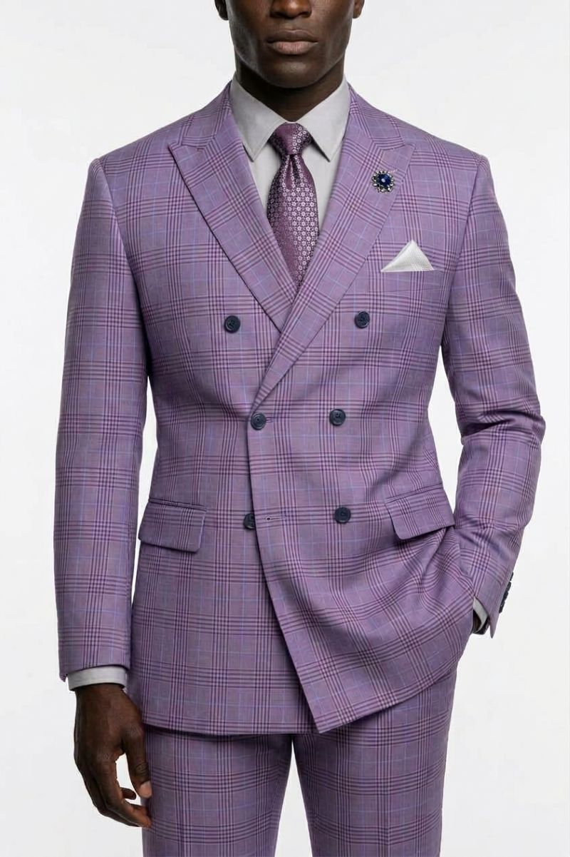 A man wearing a lavender-purple double-breasted suit with a subtle windowpane plaid pattern, styled with a white dress shirt, a matching patterned tie, and a white pocket square.