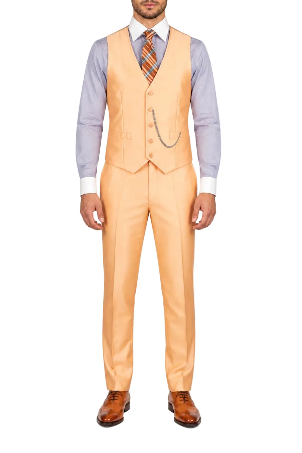 A man wearing a peach-colored three-piece suit with a matching vest and trousers, a light blue dress shirt, a patterned orange and blue tie, and brown leather dress shoes, standing against a plain white background.