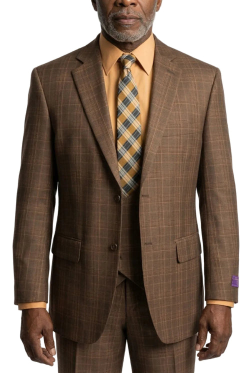 A man wearing a brown plaid suit with a matching vest and trousers, styled with a mustard yellow shirt and a yellow-and-blue plaid tie, against a plain white background.