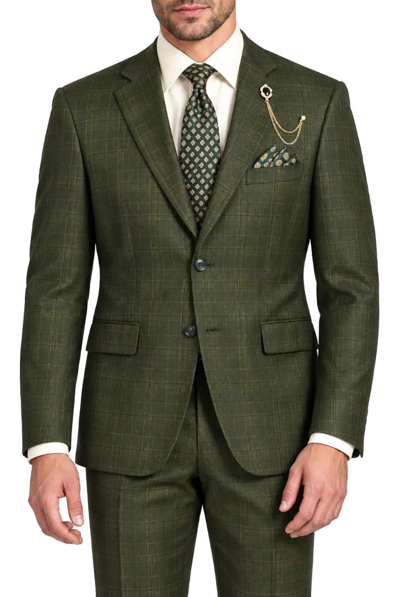 A man wearing an olive green plaid three-piece suit with a white dress shirt, a patterned green tie, and a pocket square, shown from the waist up against a white background.