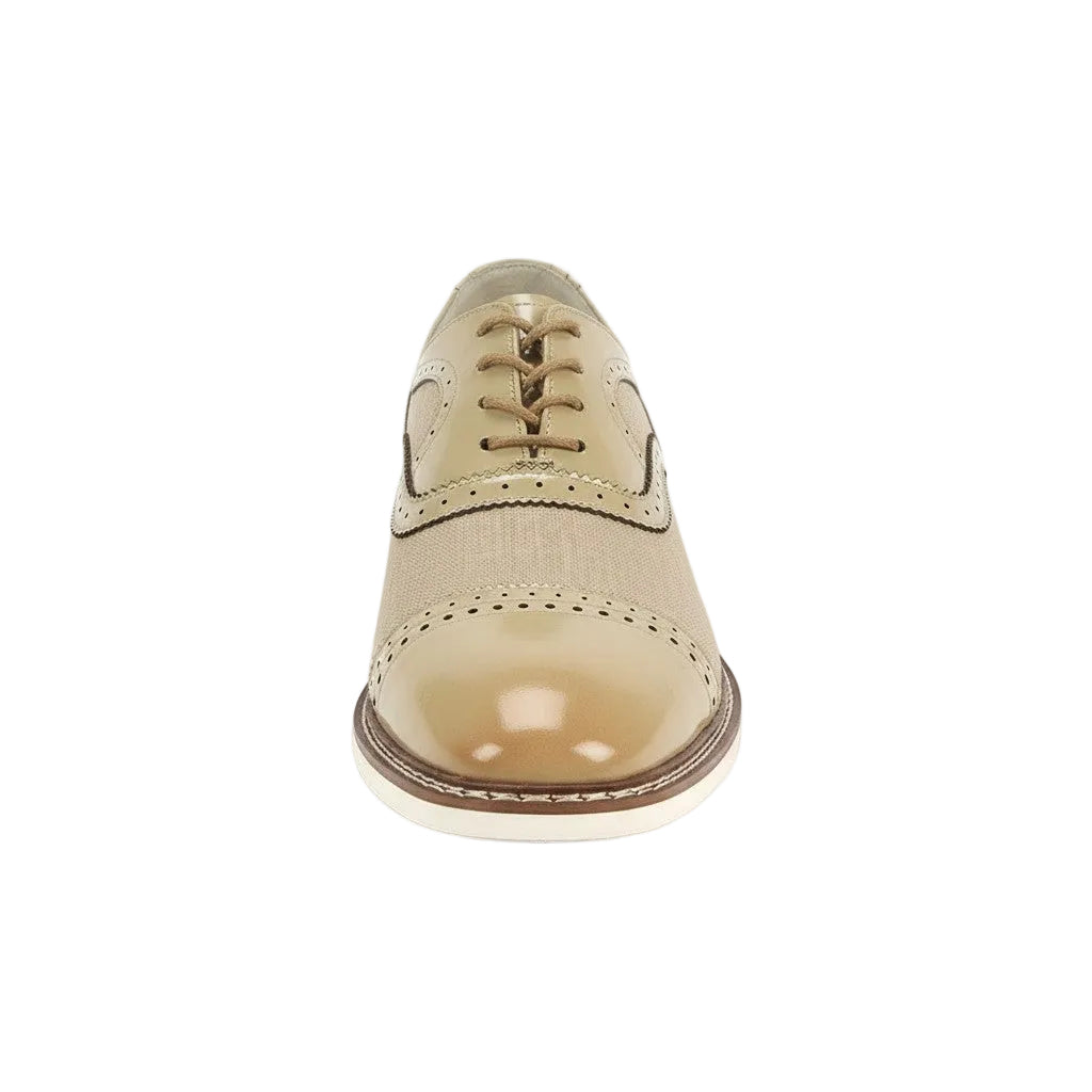 Beige leather shoe on a white background