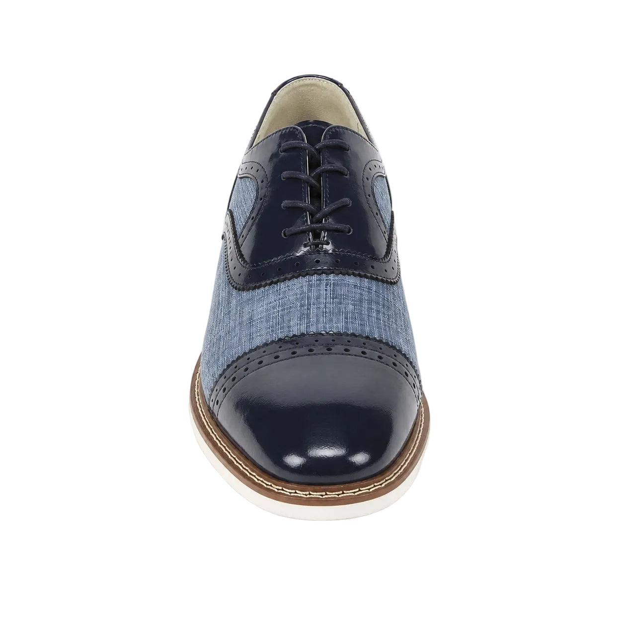 A men's cap-toe oxford shoe featuring a glossy sapphire blue patent leather toe cap and laces, a light blue denim-textured side panel, and a brown and white welted sole, shown from a front-facing perspective on a white background.