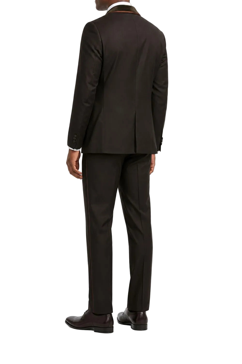 A man viewed from the back wearing a dark brown suit, consisting of a jacket and trousers, paired with dark brown dress shoes against a plain white background.