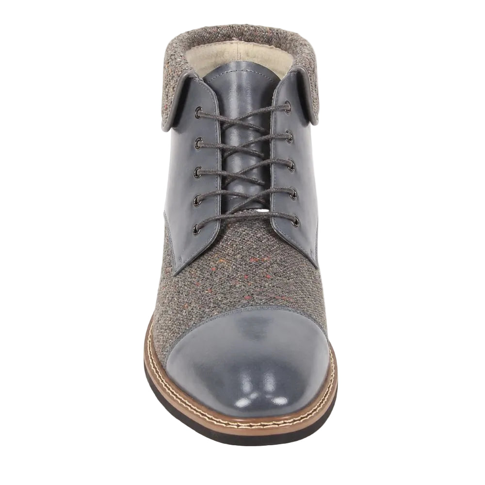 A single lace-up ankle boot shown from the front on a white background. The boot features a dark gray leather cap toe, a gray tweed upper, dark gray laces, and a brown and beige welted sole.