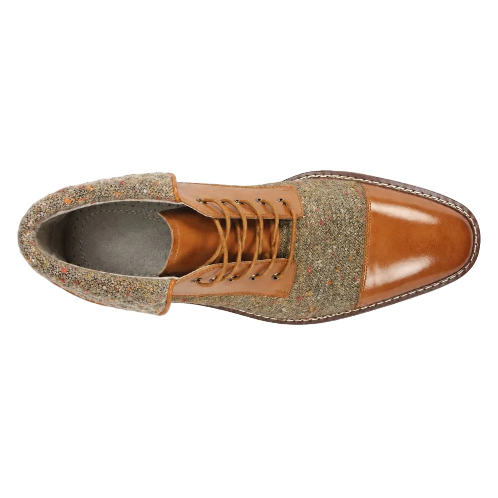 A single men's lace-up shoe shown from a top-down view, featuring a smooth tan leather toe cap and heel counter, tan leather laces and lining, and a multicolor tweed fabric upper with a speckled brown base.