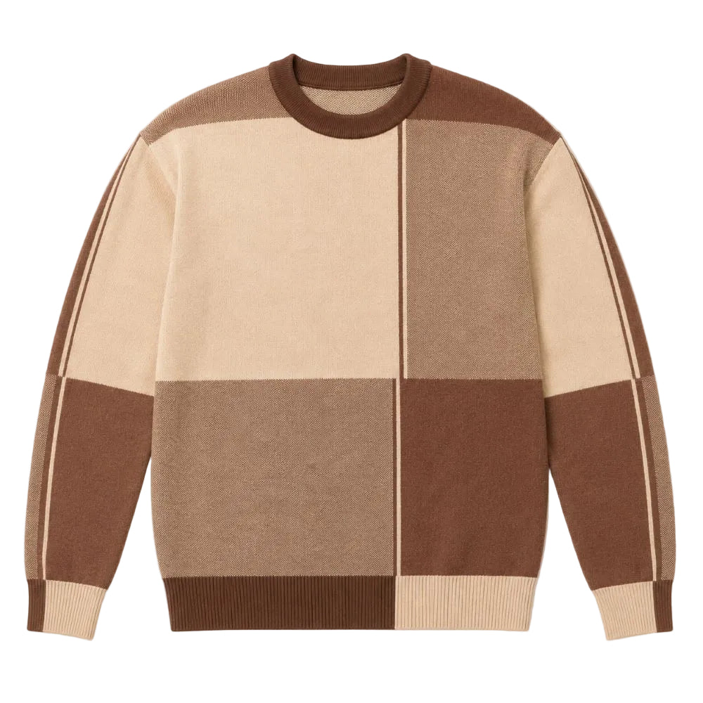 A color-block knit sweater with a crew neck, featuring panels of beige, tan, and brown, laid flat against a white background.