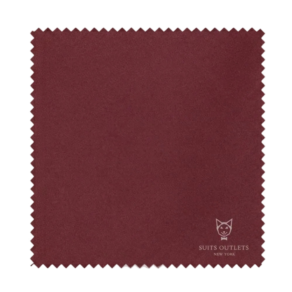 Close-up of the solid textured weave burgundy fabric from the Monte Carlo Collection suit.