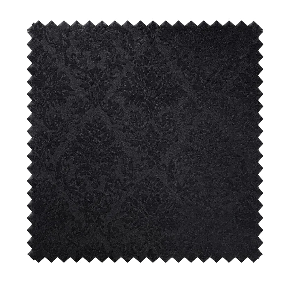 A square fabric swatch with serrated edges, showing a black damask pattern on a white background.