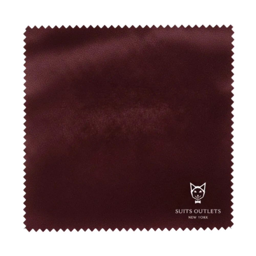 Burgundy fabric swatch with Suits Outlets New York logo