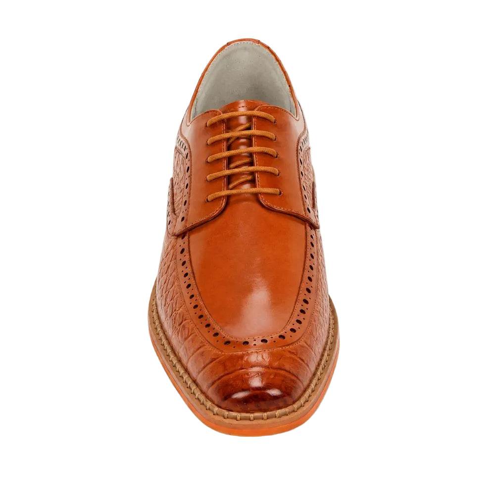 A single men's oxford dress shoe in a warm cognac brown leather, featuring a brogue design with perforated detailing, a glossy toe cap, and a textured crocodile-embossed side panel, shown from a top-down view on a white background.