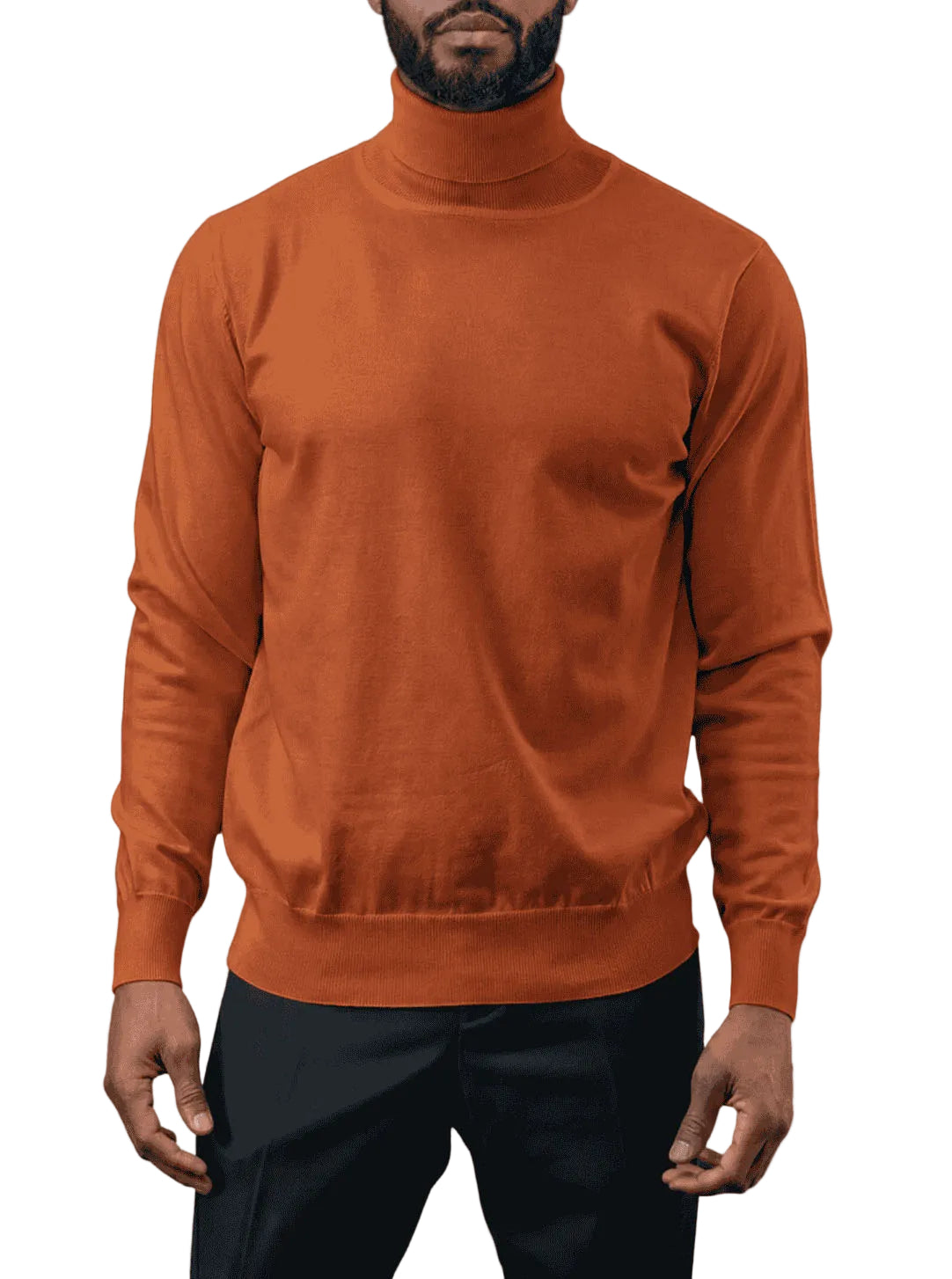 A man wearing a rust-orange long-sleeve turtleneck sweater and black pants, shown from the chin down against a plain white background.
