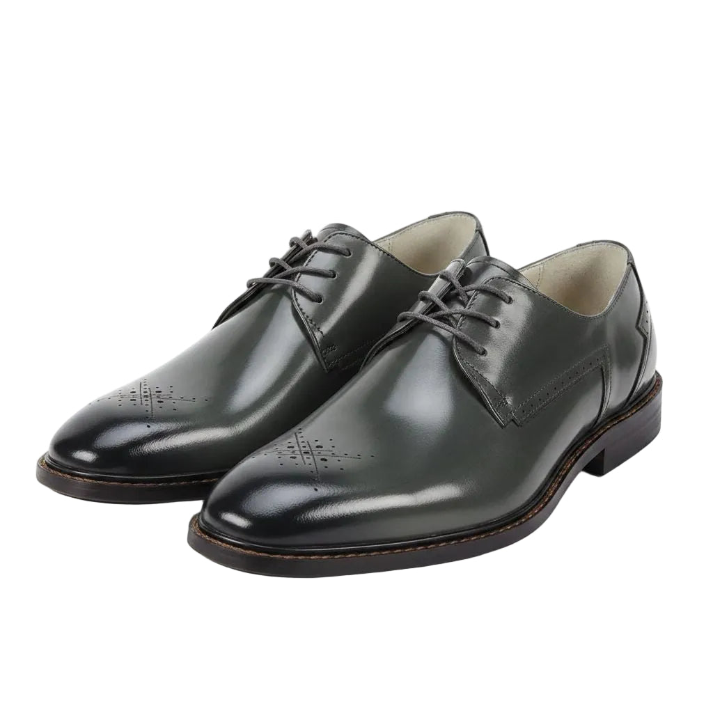 Pair of black dress shoes on a white background