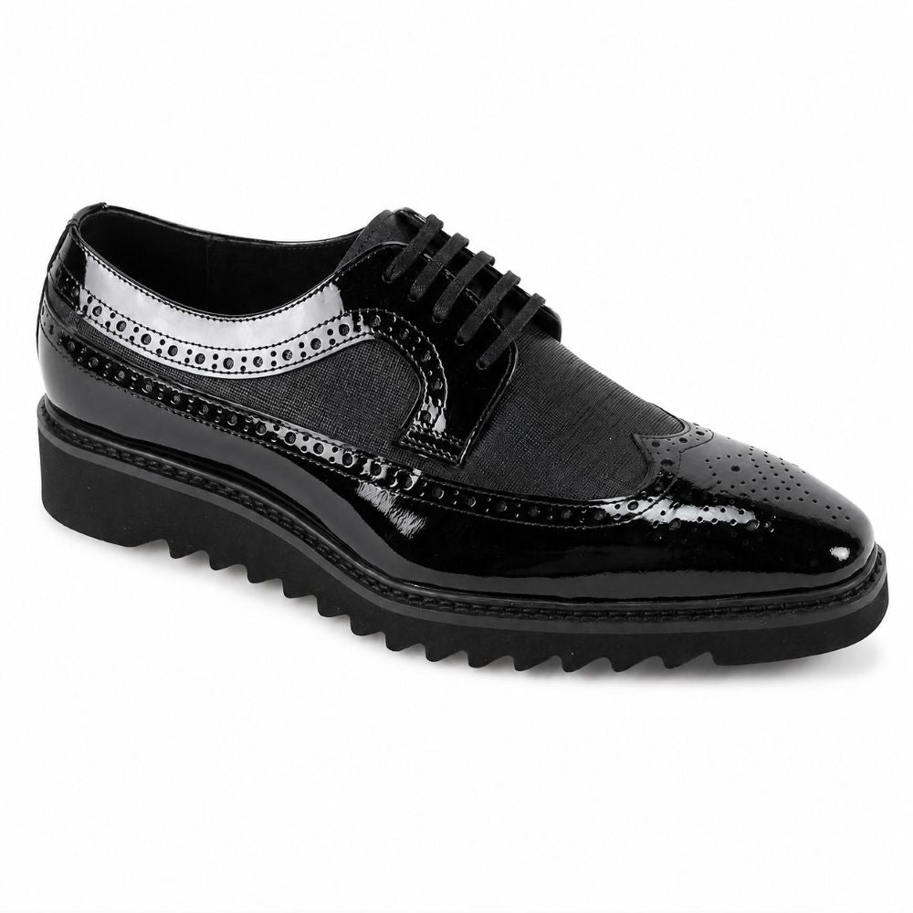Black spiked sneaker on a white background