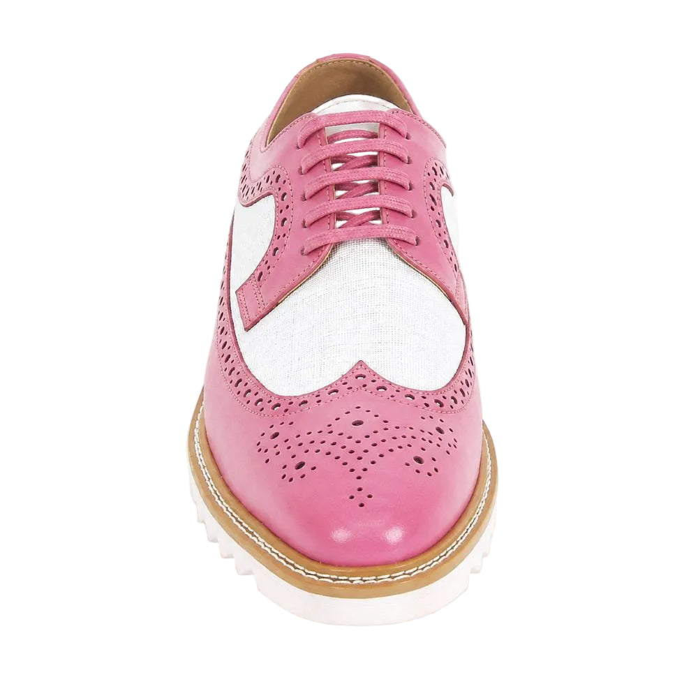 A pink and white wingtip brogue shoe with a chunky white sole and tan midsole, shown from a top-down view on a white background.