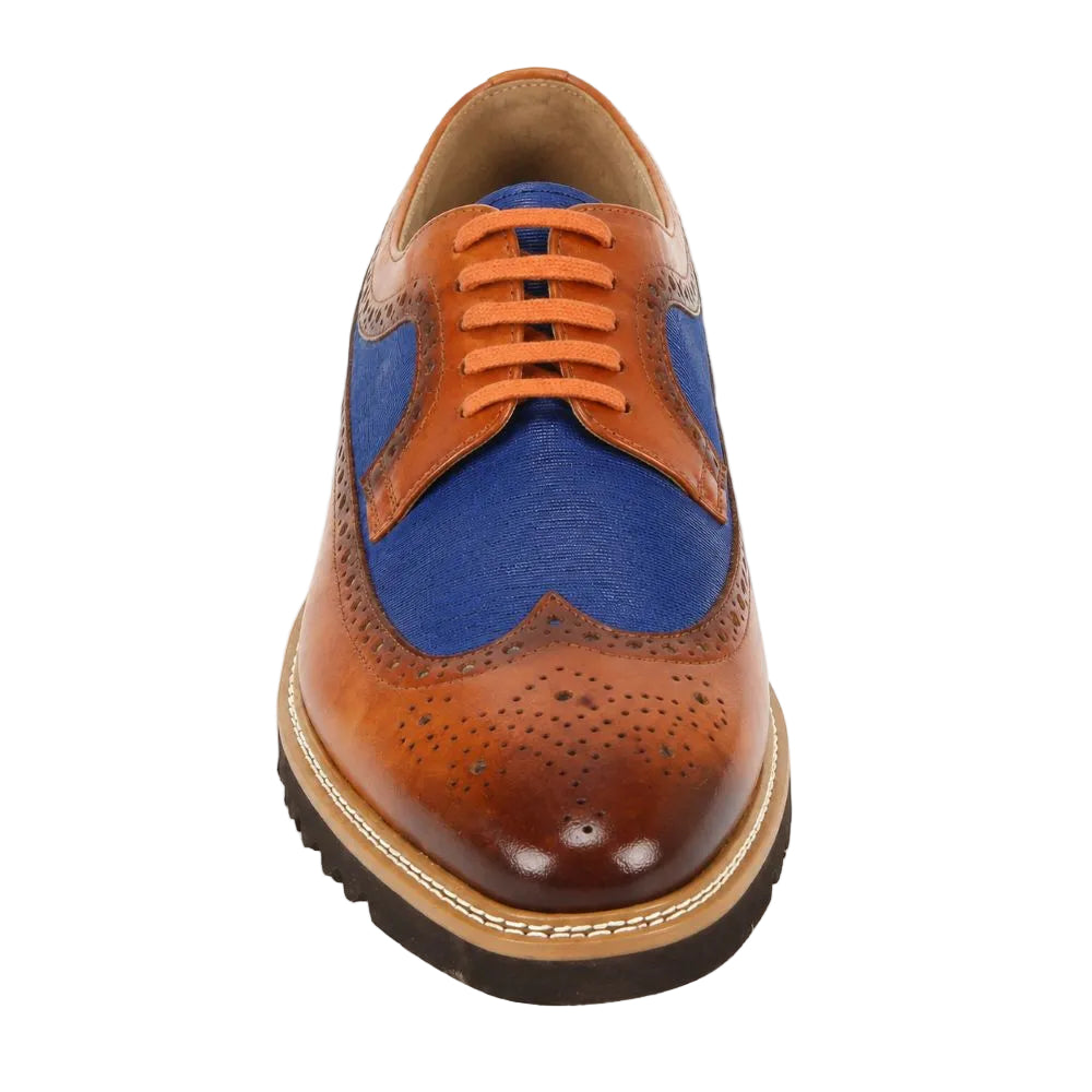 A men's wingtip oxford shoe featuring a brown leather toe and quarter, a vibrant blue canvas side panel, and orange laces, shown from a front-facing perspective on a white background.