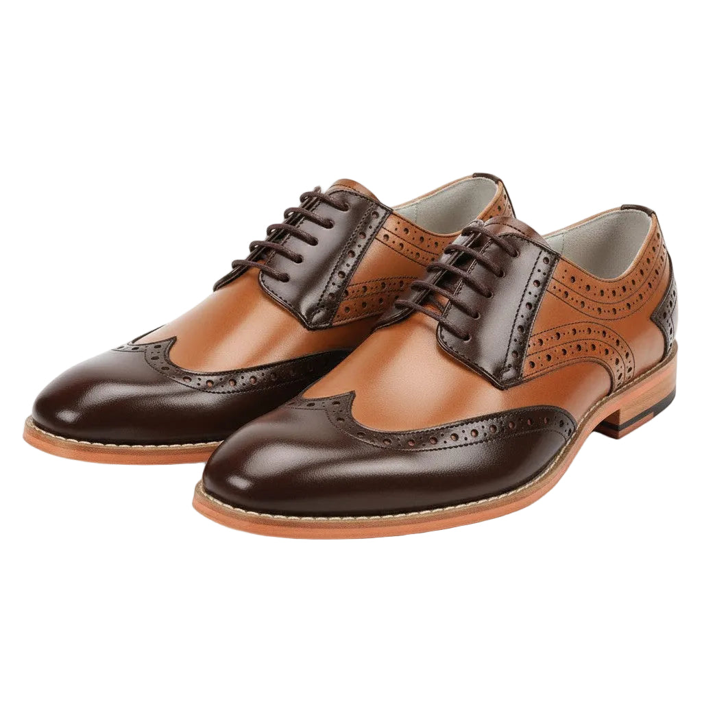 Brown and black wingtip shoes on a white background