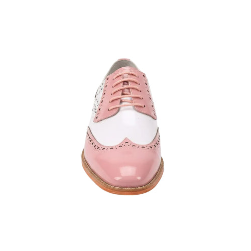 Pink and white brogue shoe on a white background