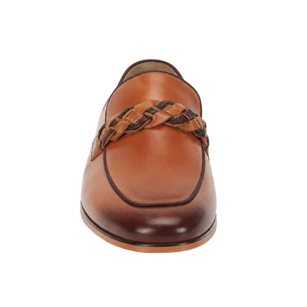 A single men's leather loafer shown from a front-facing angle on a clean white background. The shoe features a warm tan leather upper with a darker brown gradient toe, a decorative braided strap across the vamp, and dark contrast stitching.