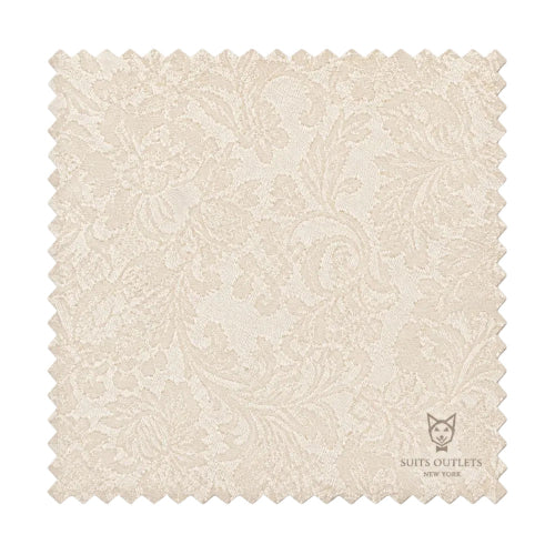 A square fabric swatch with scalloped edges, featuring a light beige and cream damask floral pattern. The Suits Outlets New York logo is printed in the bottom right corner.