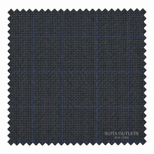 A square fabric swatch with zigzag-cut edges, showing a dark charcoal gray woven texture with a subtle blue windowpane plaid pattern. The text 'SUITS OUTLETS NEW YORK' is printed in white in the bottom right corner.