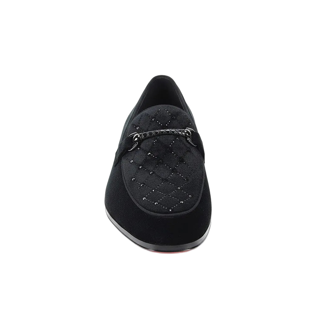 Black loafer shoe with decorative chain on a white background