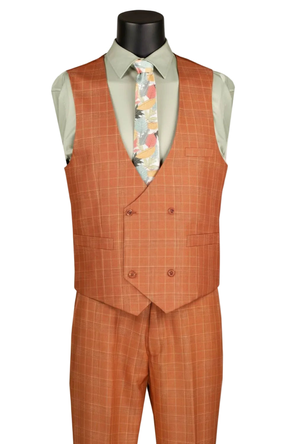 Orange checkered vest and pants with a floral tie on a mannequin against a white background