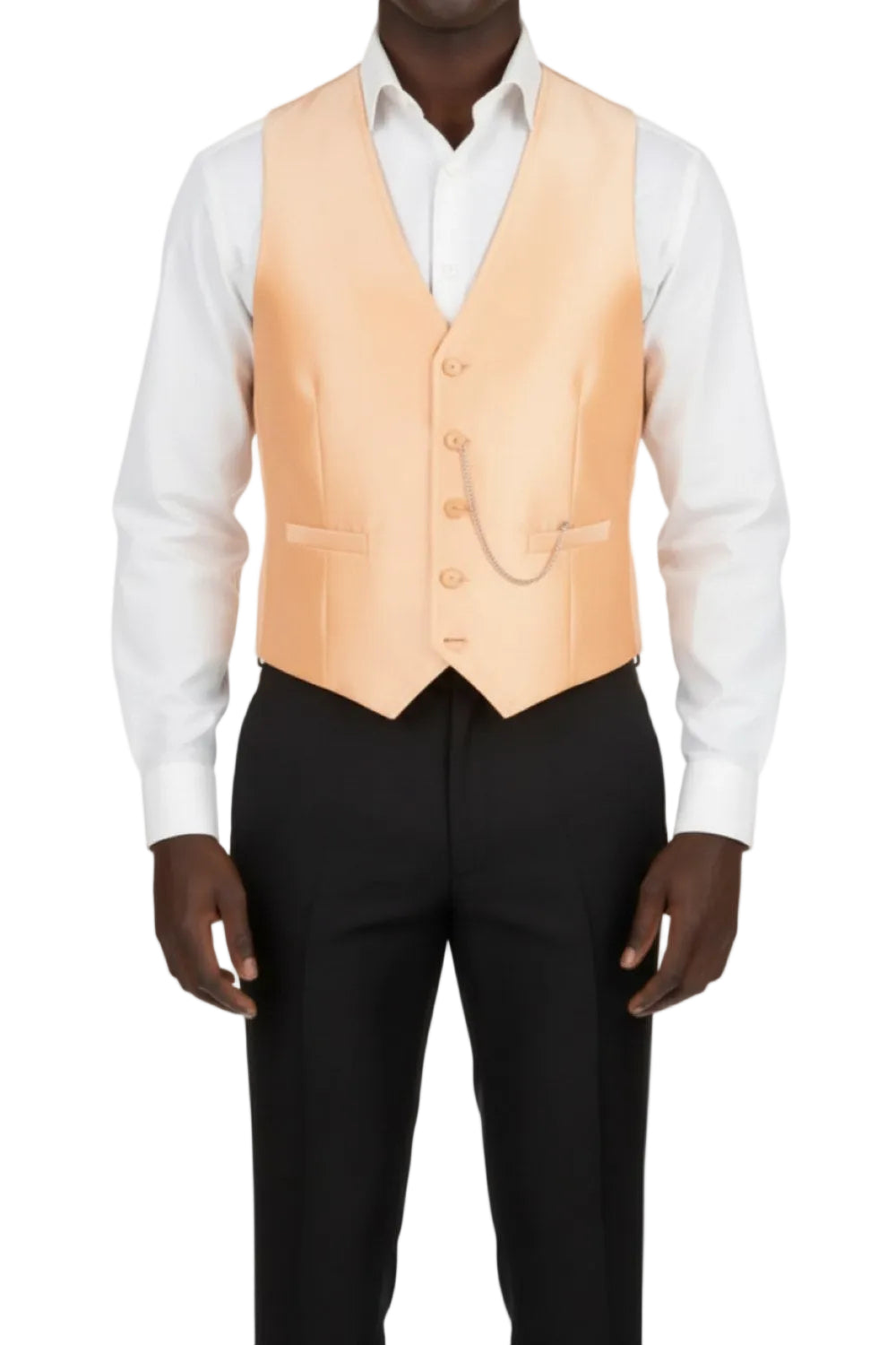 Man wearing a peach vest over a white shirt and black pants on a white background