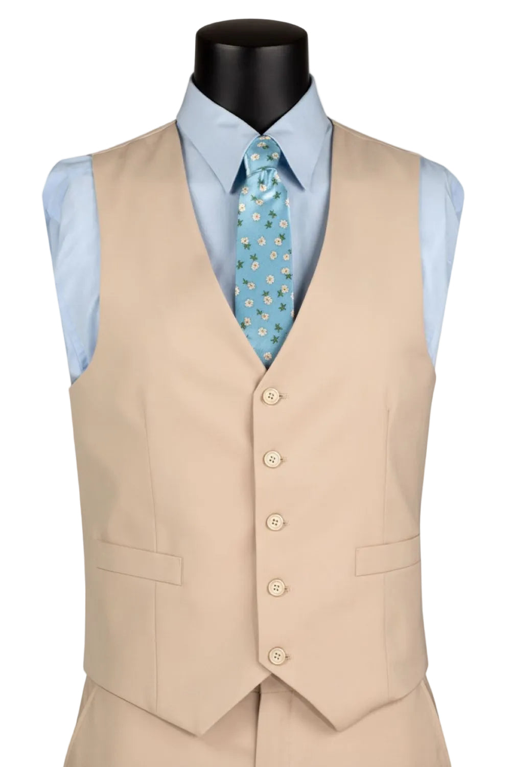 Beige vest over a light blue shirt with a patterned tie on a mannequin against a white background